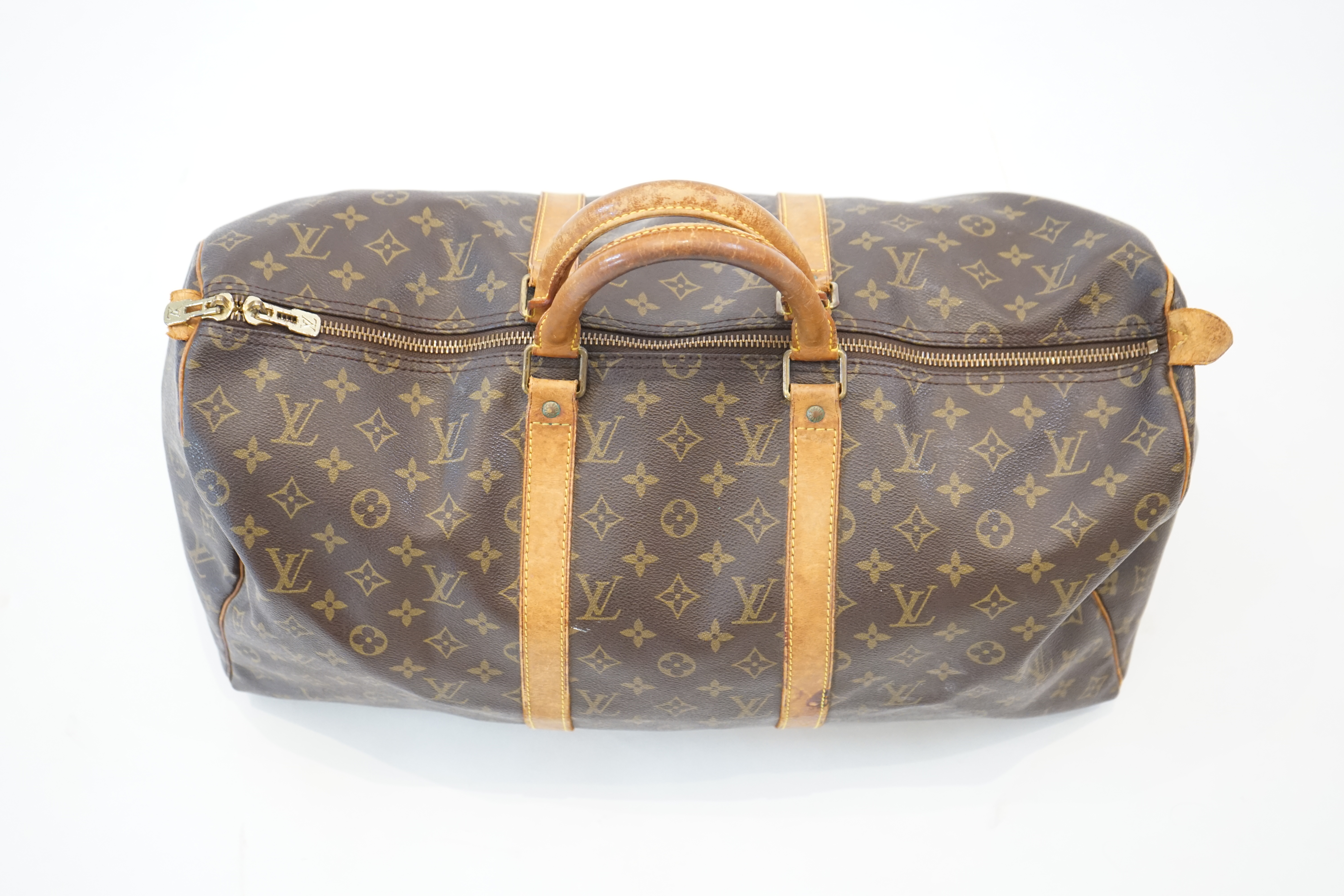 A Louis Vuitton Speedy 40 bag width 22cm, length 51cm, height 28cm